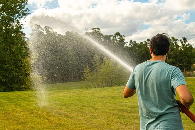 hose, nature, water, splash, spray, lawn, field, watering, outdoors, man. Smart Yard Technology for Renters: A Reversible Water Path