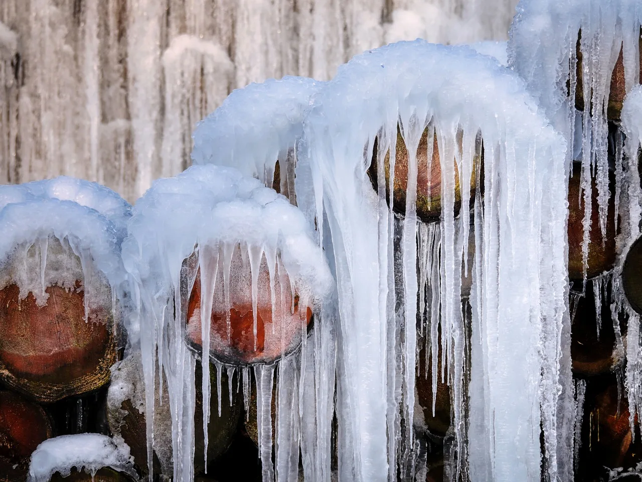 tree trunks, logs, frozen, snow, nature, frost, ice crystals, icicles, hoarfrost, snowy, wintry, freezing temperatures, cold, winter, winter magic, icy, iced, wood, wood irrigation, woodwork, timber storage, kahl. Winterize Smart Irrigation Canada: 7 Sensor-Safe Steps